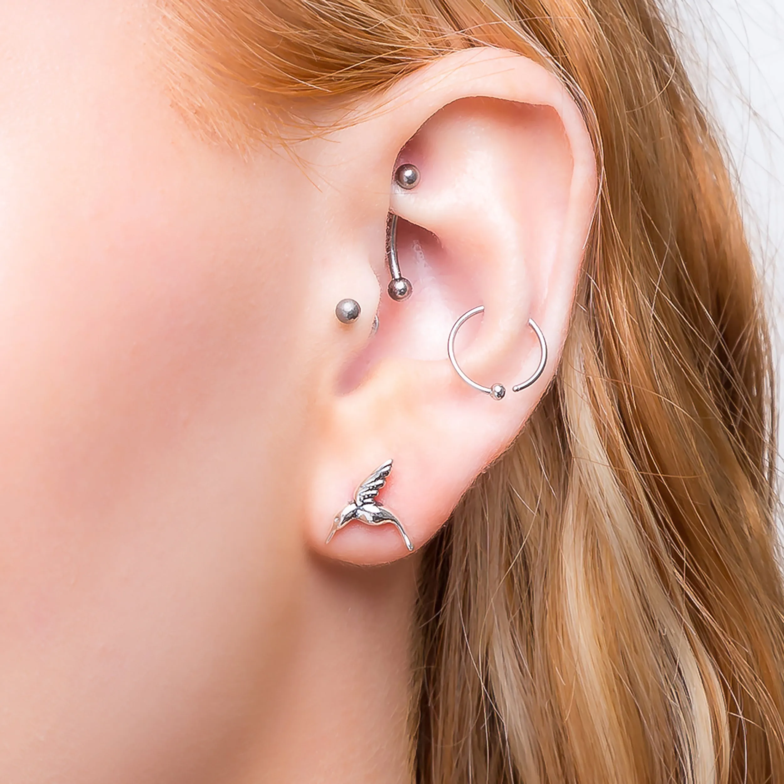 Miniature Hummingbird Stud Earrings in Silver sold by Henryka product image thumbnail 2