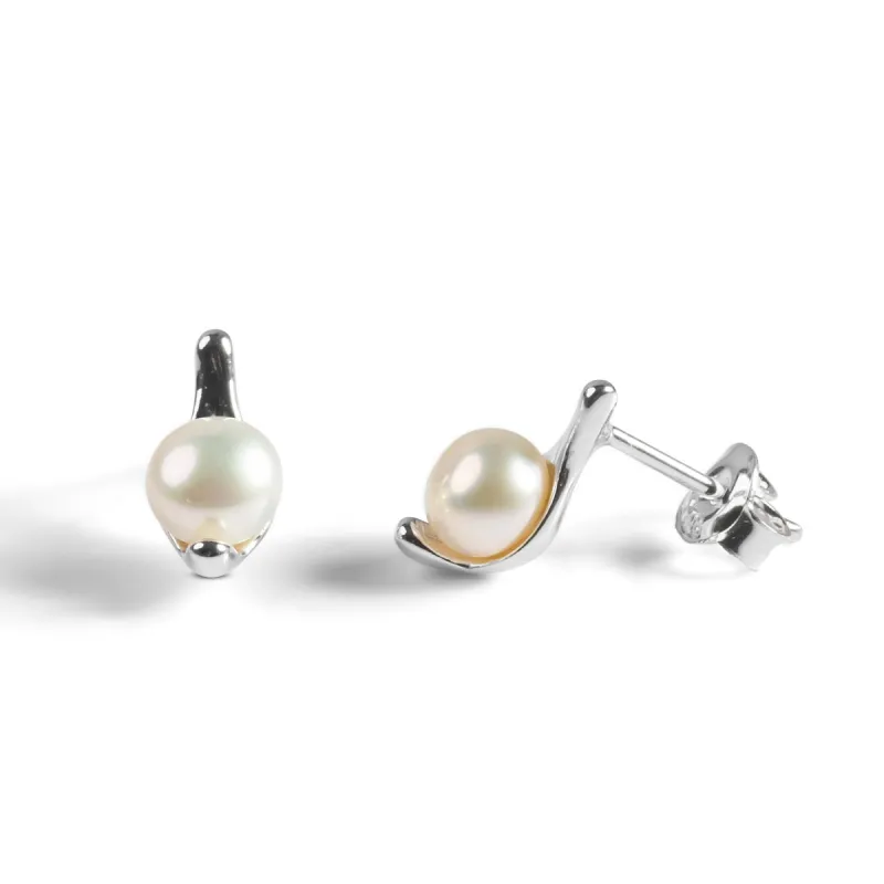 Elegant Stud Earrings in Silver and Pearl sold by Henryka