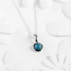 Round Charm Necklace in Silver and Blue Opal sold by Henryka