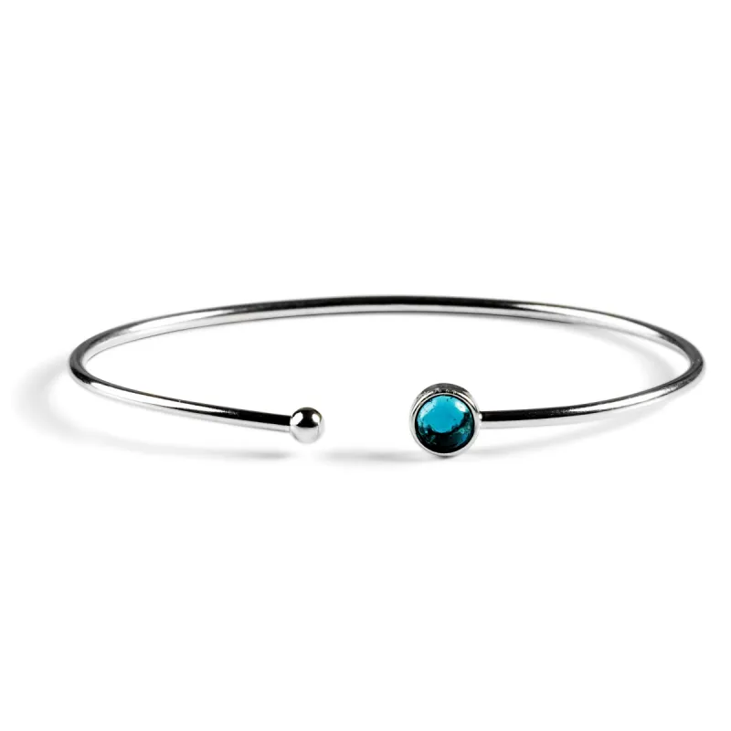 Simple Solo Cuff Bangle in Silver and London Blue Topaz sold by Henryka