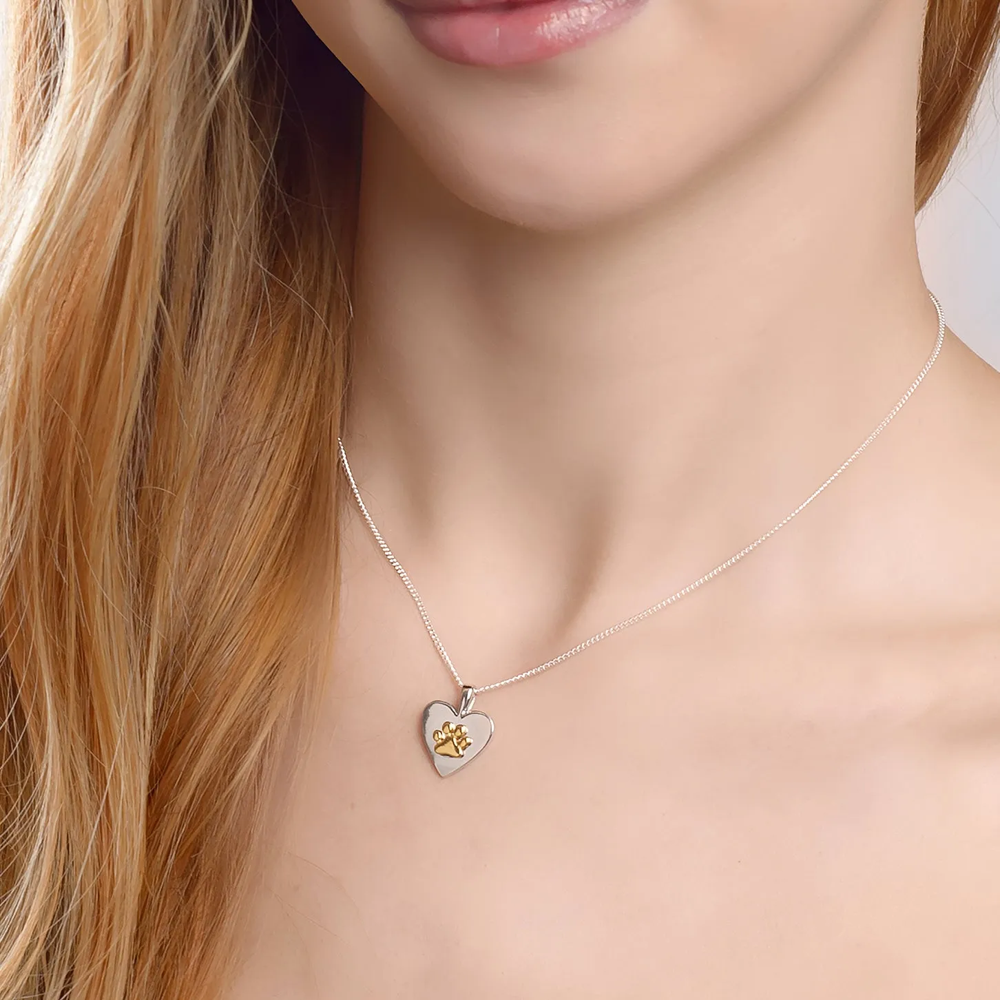Paw Print Heart Necklace in Silver & 18ct Gold Vermeil sold by Henryka product image thumbnail 2