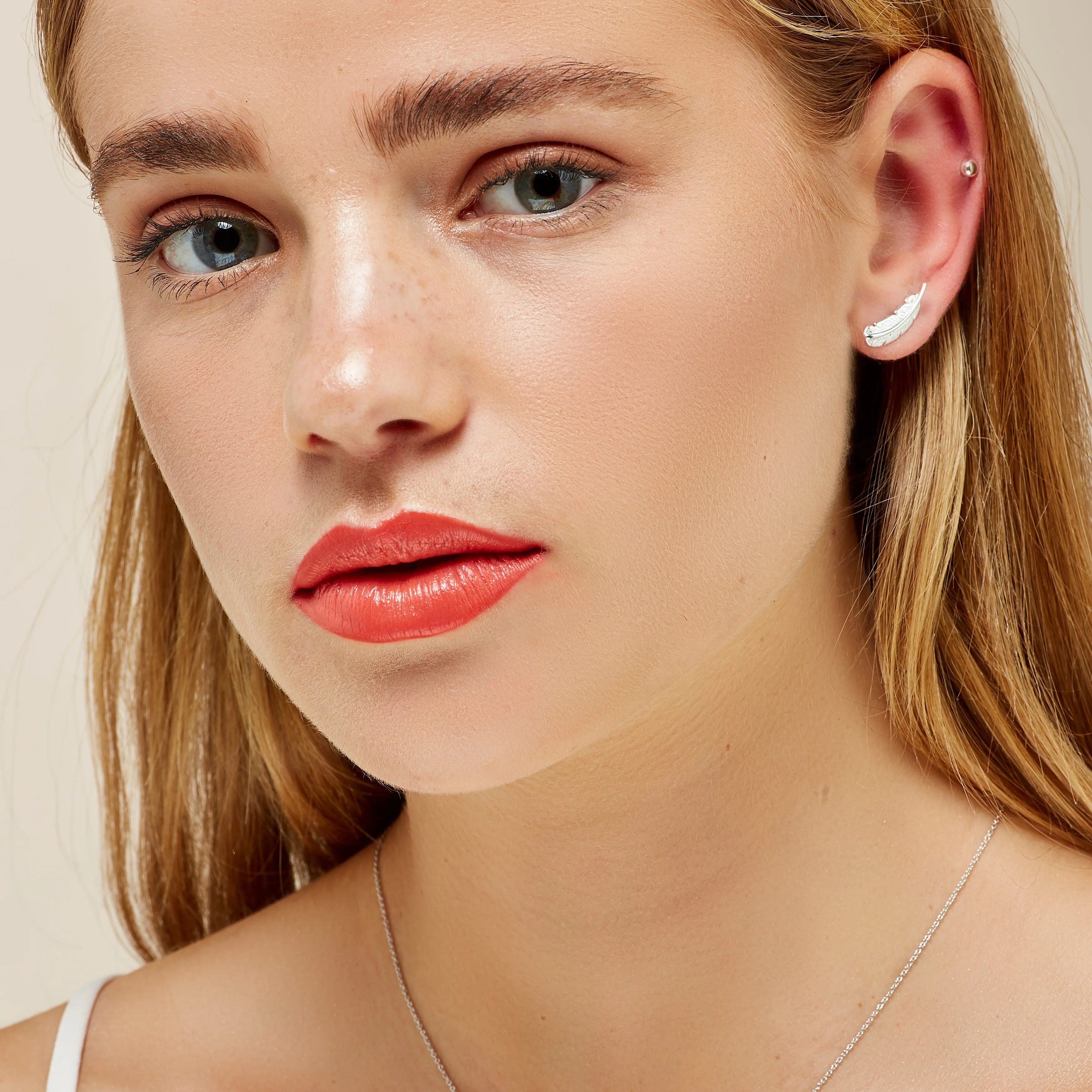 Feather Stud Earrings in Silver sold by Henryka product image thumbnail 3