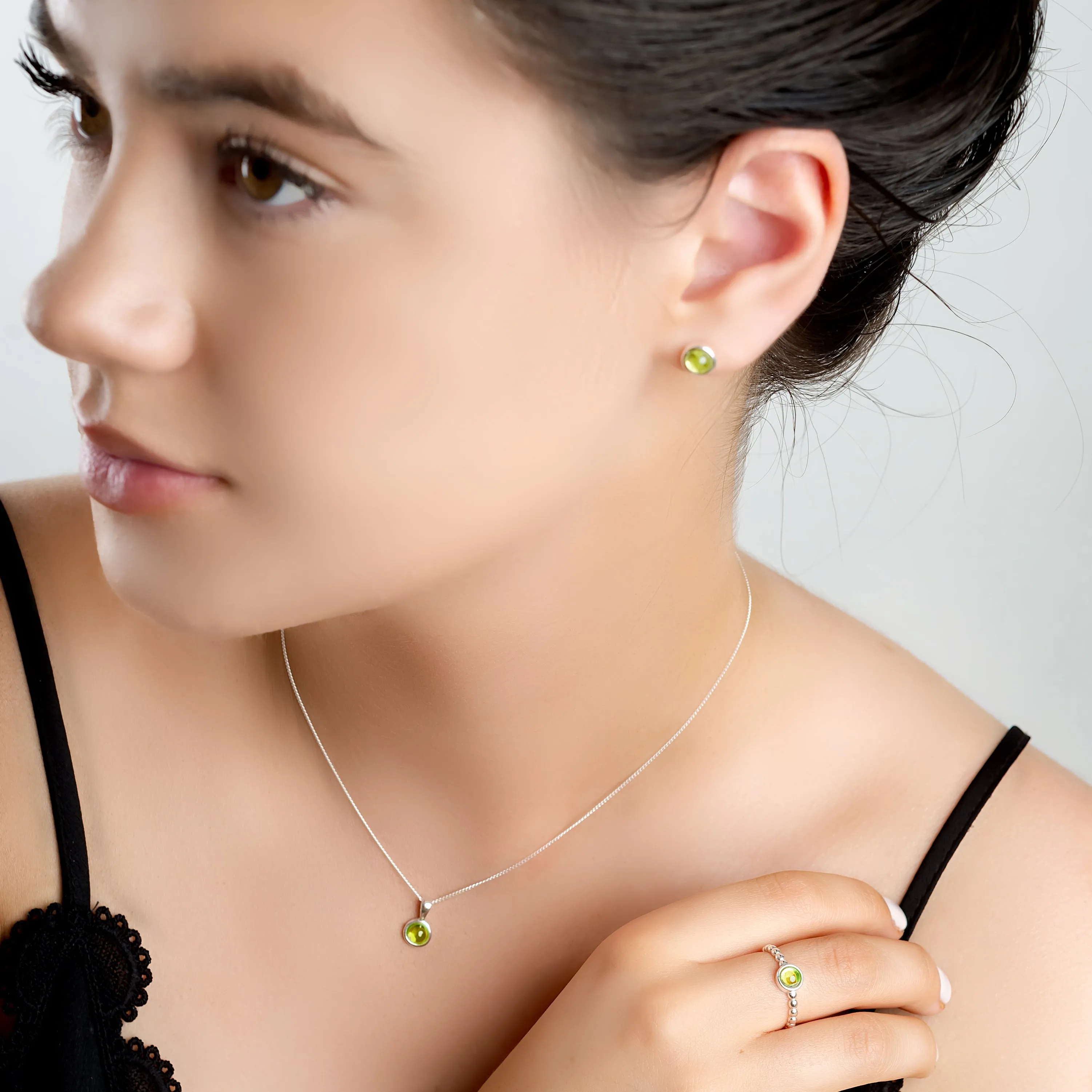 Small Round Stud Earrings in Silver and Peridot sold by Henryka product image thumbnail 4