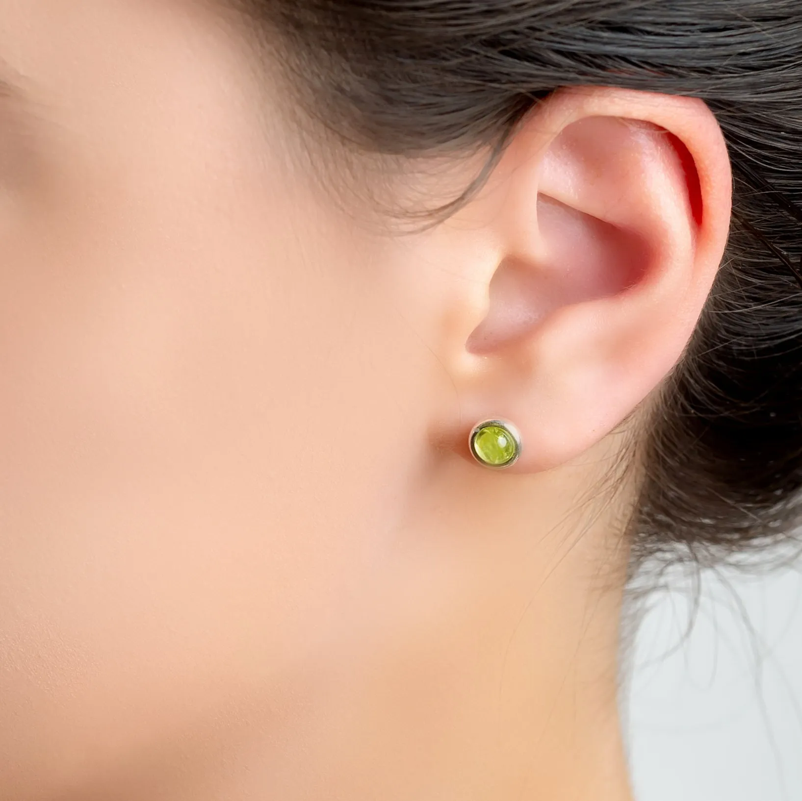 Small Round Stud Earrings in Silver and Peridot sold by Henryka product image thumbnail 2