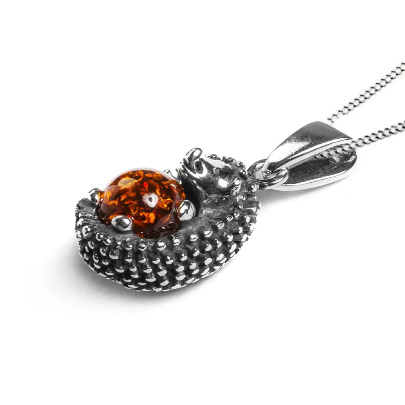Hedgehog Necklace in Silver and Cognac Amber sold by Henryka