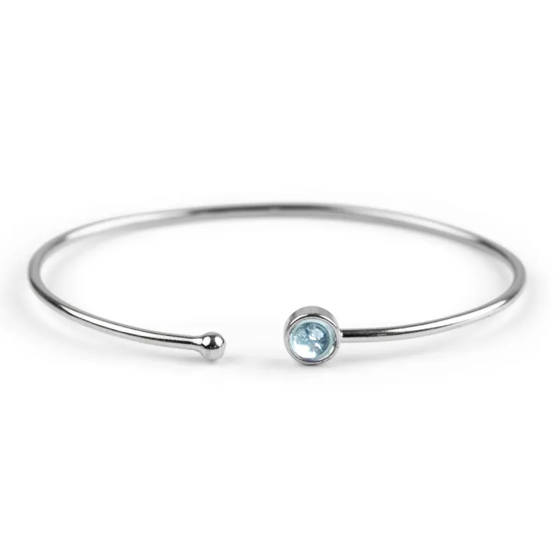 Simple Solo Cuff Bangle in Silver and Blue Topaz sold by Henryka