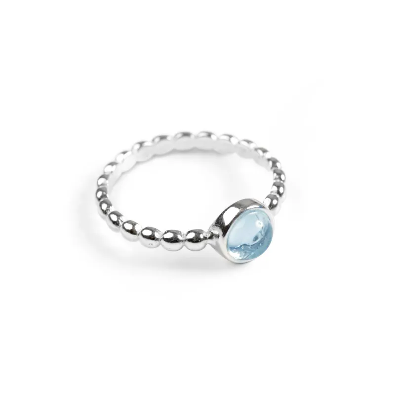 Circle Ring in Silver and Very Light Blue Topaz sold by Henryka