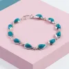 Classic Teardrop Link Bracelet in Silver and Turquoise sold by Henryka
