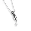 Miniature Cat Necklace in Silver sold by Henryka
