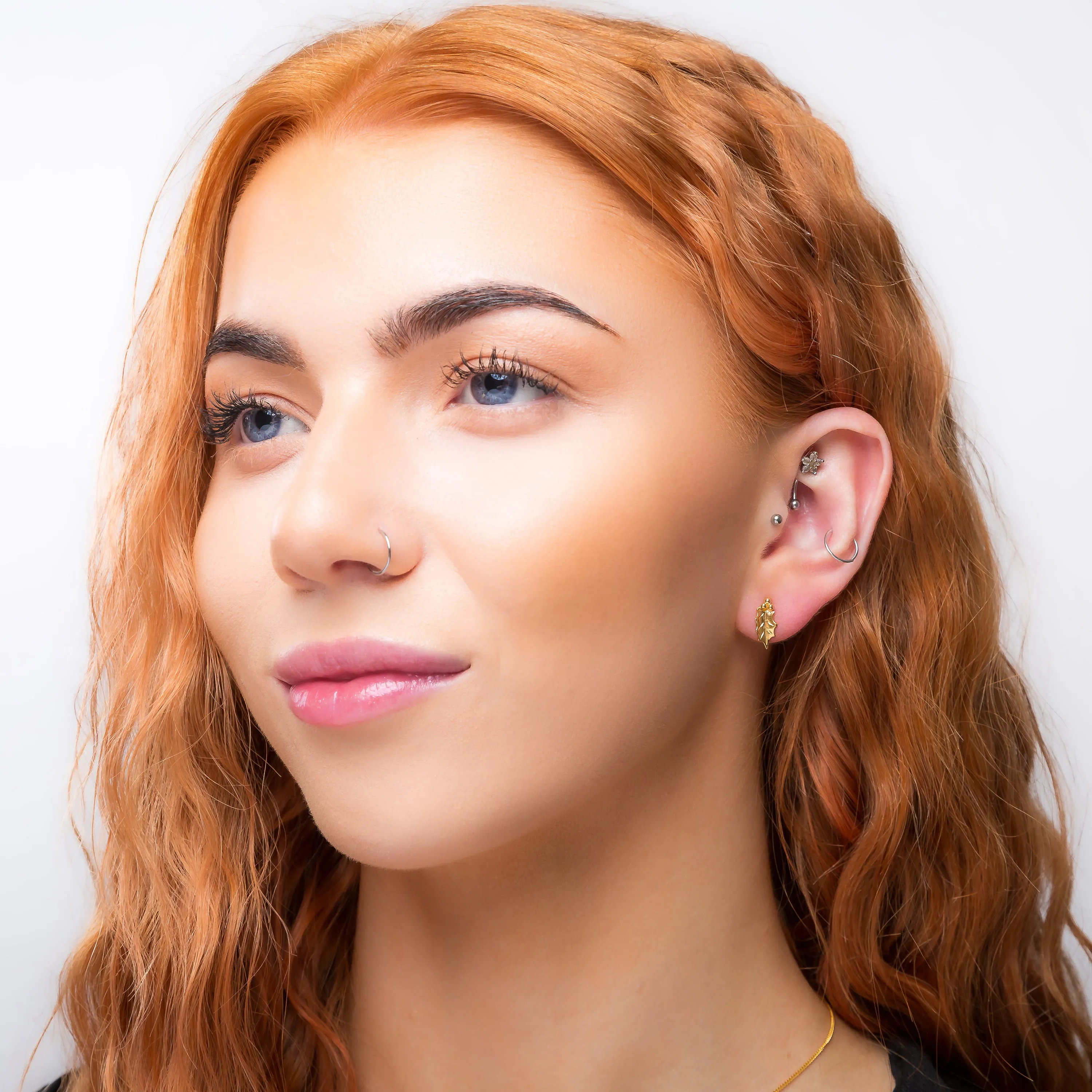 Holly Leaf Stud Earrings in Silver with 24ct Gold sold by Henryka product image thumbnail 3