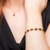 Classic Teardrop Link Bracelet in Silver with 24ct Gold & Garnet sold by Henryka