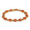 Classic Teardrop Link Bracelet in Silver with 24ct Gold & Carnelian sold by Henryka