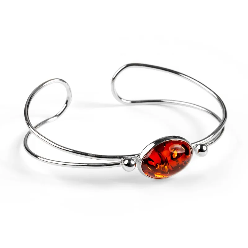 Oval Bangle in Silver with Cognac Amber Stone sold by Henryka