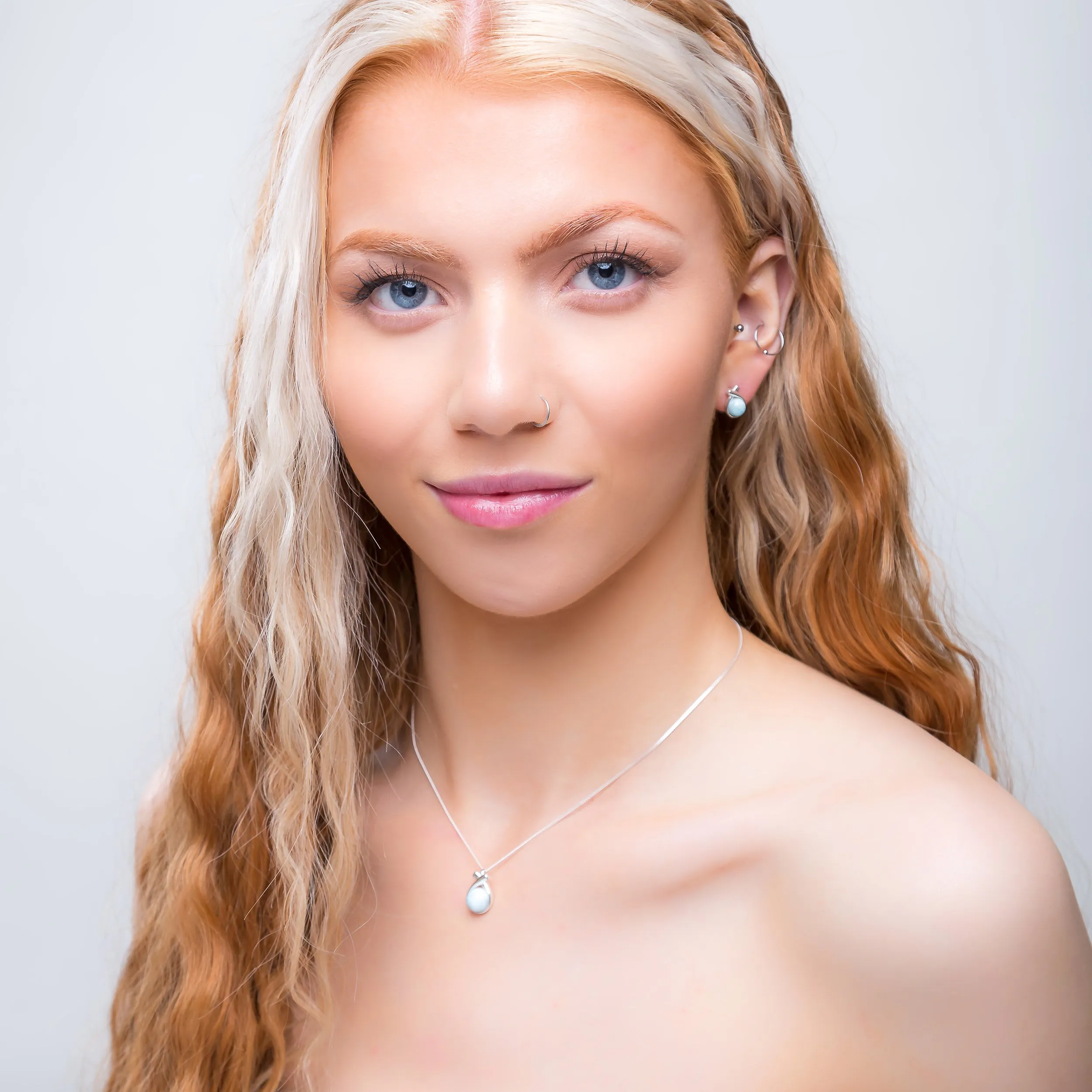 Sealed With A Kiss Stud Earrings in Silver and Larimar sold by Henryka product image thumbnail 4