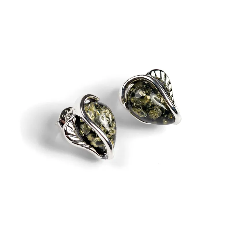 Green Amber Stud Earrings Set in Silver sold by Henryka