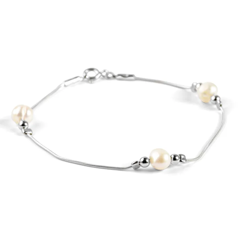Bead Bracelet in Silver and White Pearl sold by Henryka