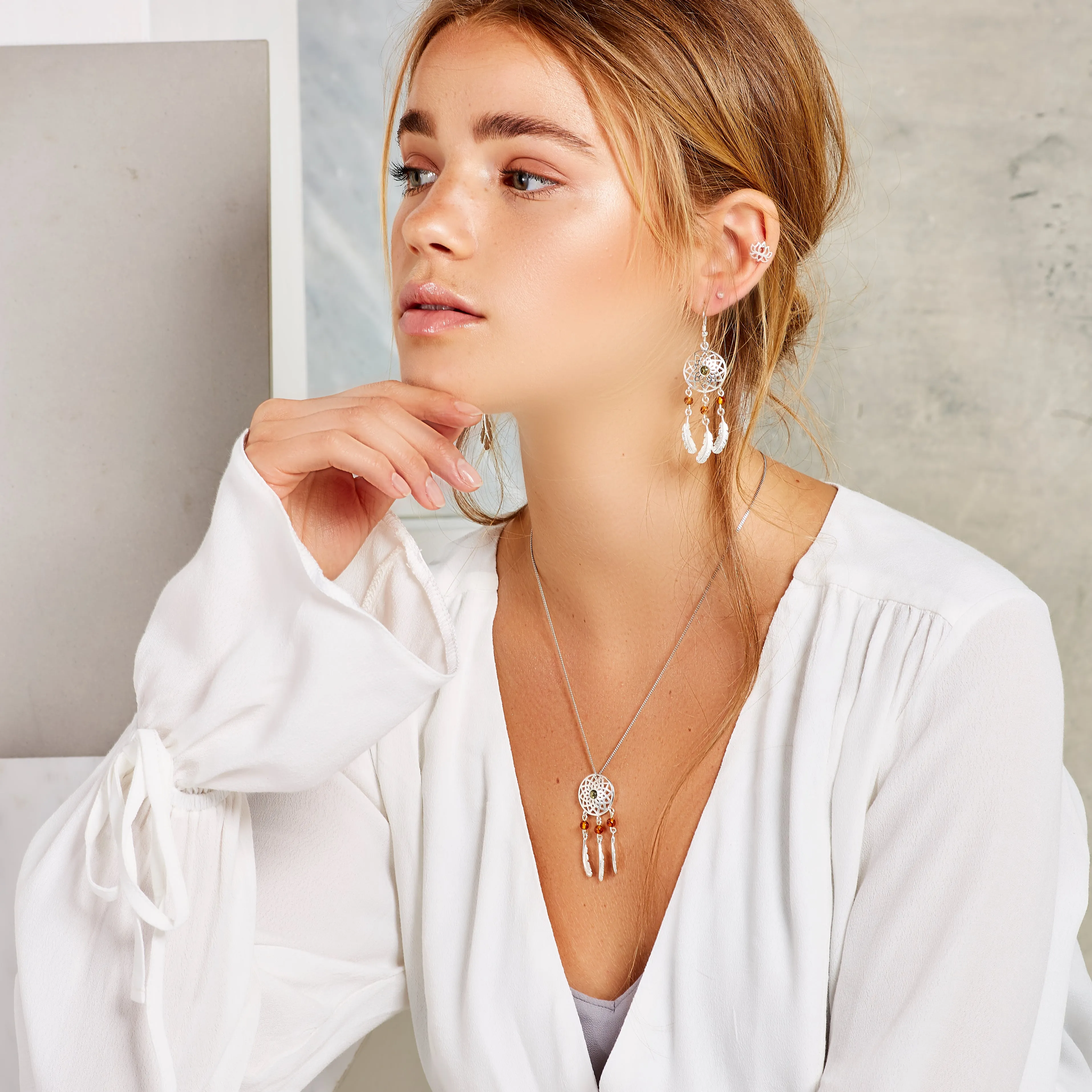 Dreamcatcher Drop Earrings in Silver and Amber sold by Henryka product image thumbnail 3