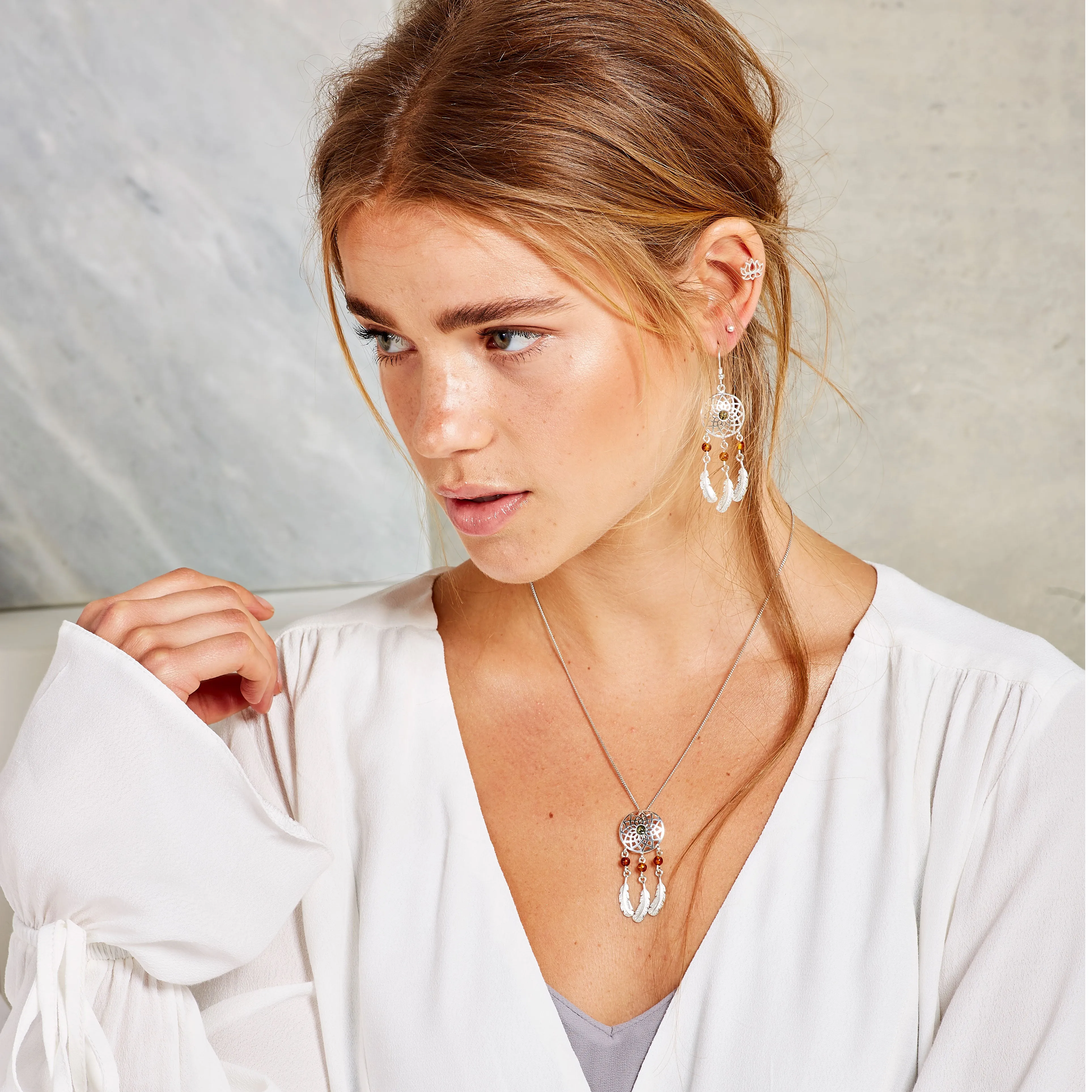 Dreamcatcher Drop Earrings in Silver and Amber sold by Henryka product image thumbnail 4