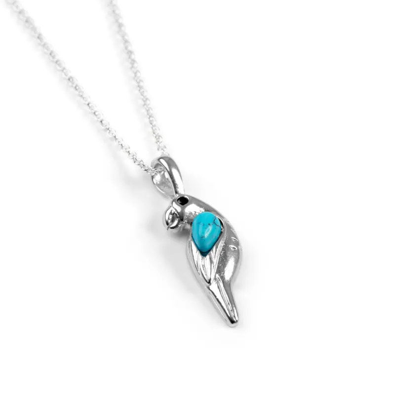 Miniature Parrot Necklace in Turquoise & Silver sold by Henryka