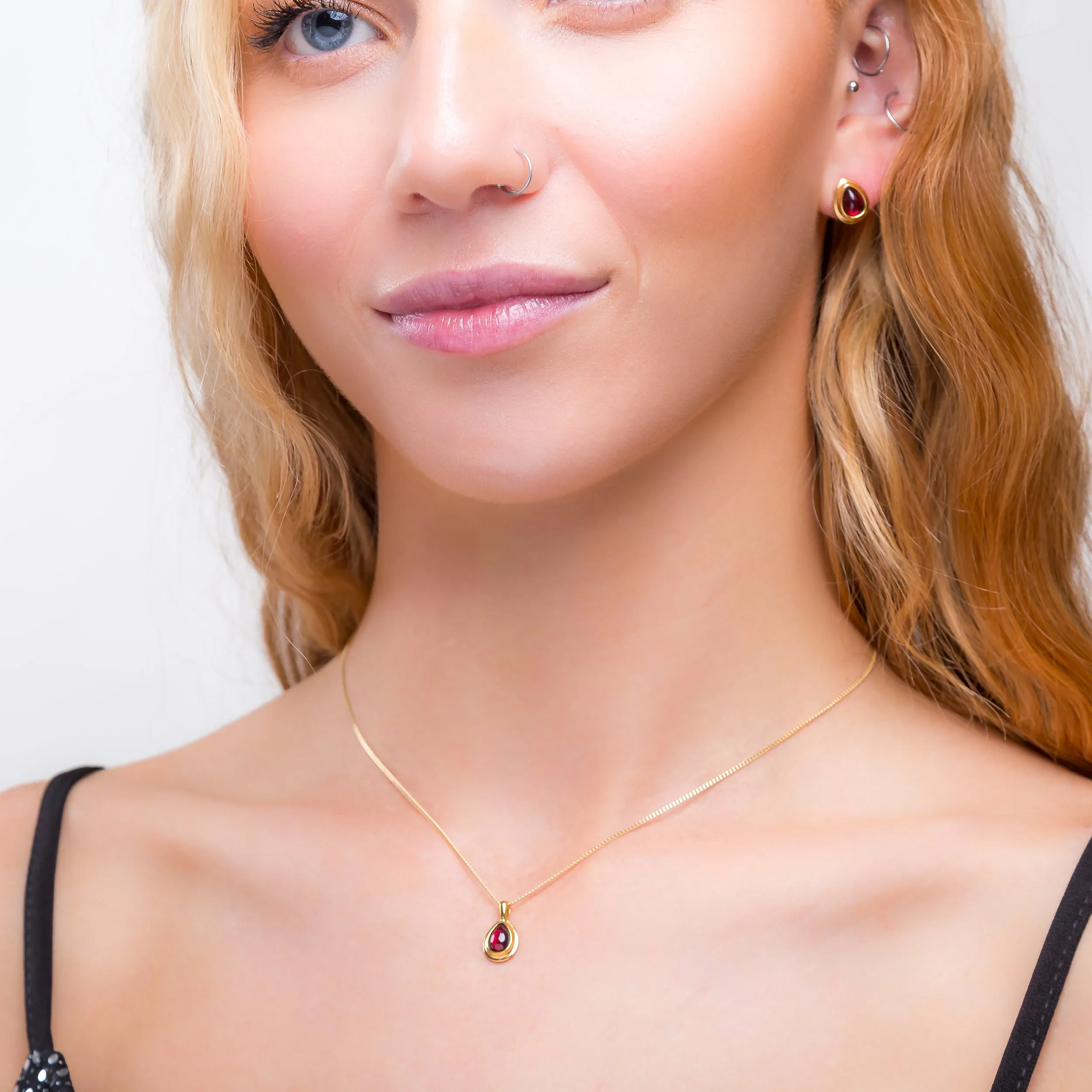 Classic Teardrop Stud Earrings in Silver with 24ct Gold & Garnet sold by Henryka product image thumbnail 4