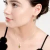 Elegant Twist Drop Earrings in Silver and Green Amber sold by Henryka