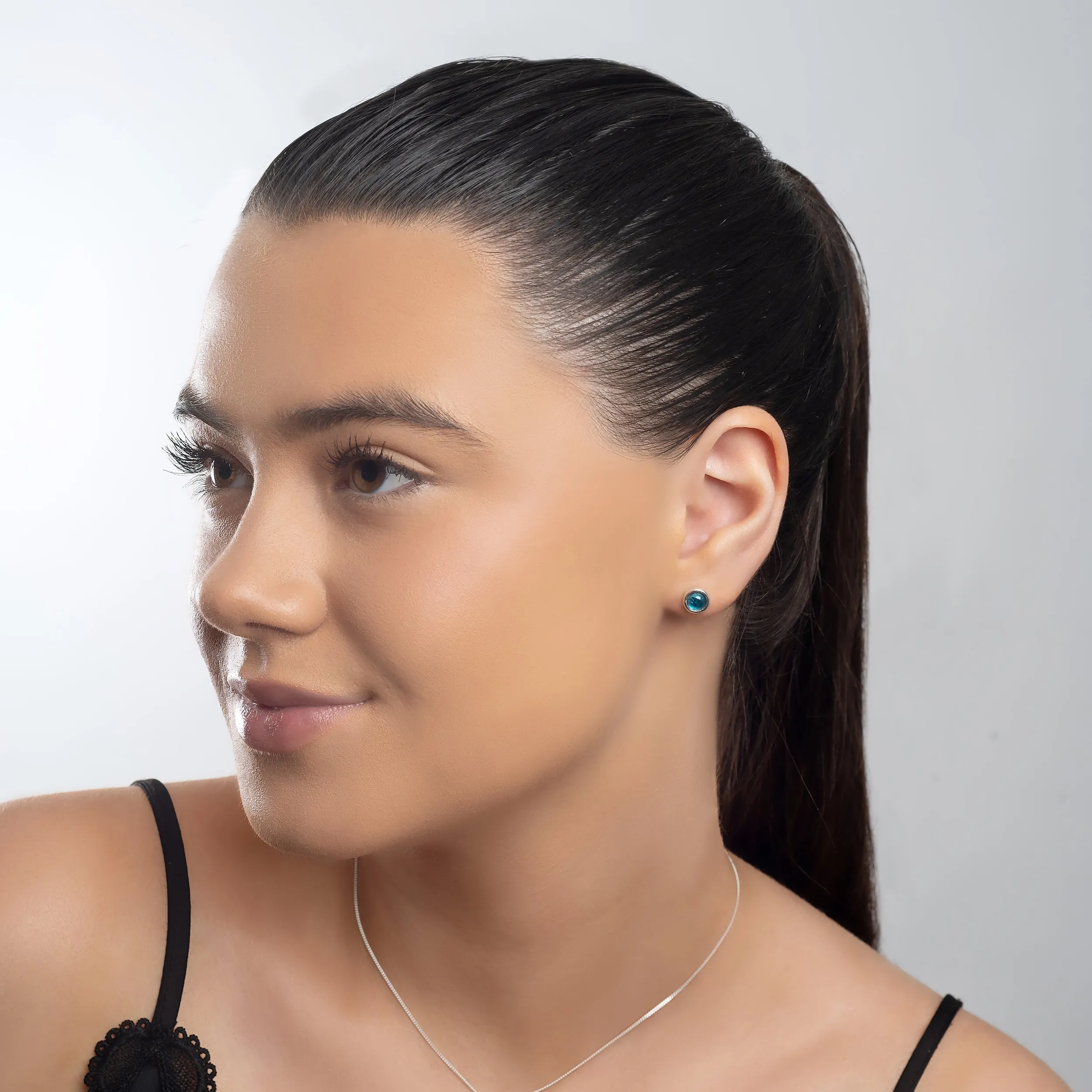 Small Round Stud Earrings in Silver and London Blue Topaz sold by Henryka product image thumbnail 3