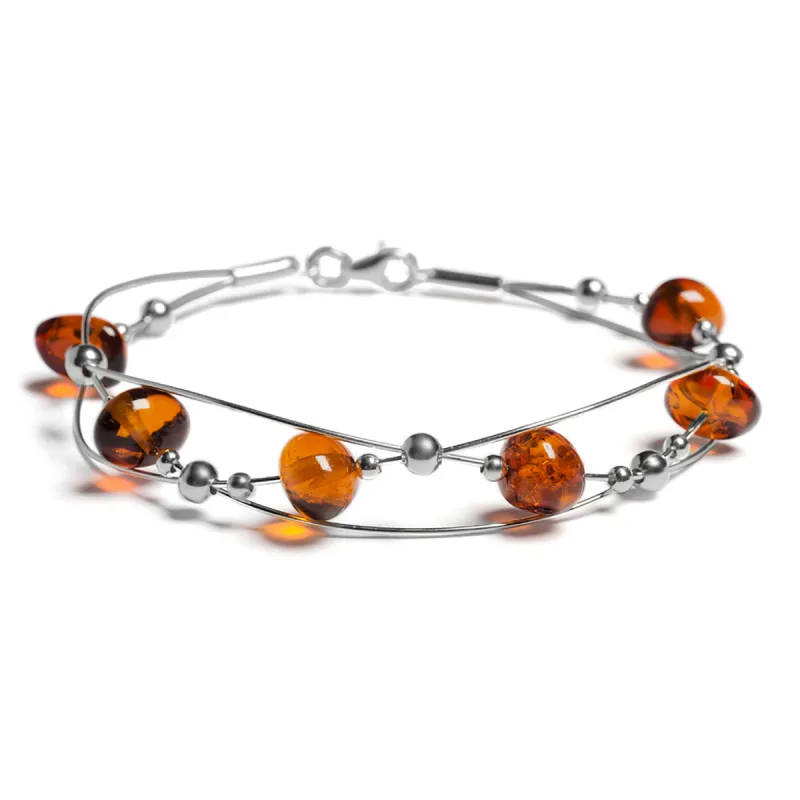 Weaved Bangle in Silver and Cognac Amber sold by Henryka