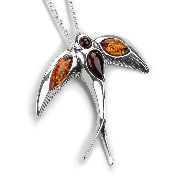 Swooping Swallow Necklace in Silver and Amber sold by Henryka