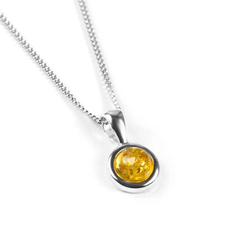 Round Charm Necklace in Silver and Yellow Amber sold by Henryka