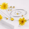 Round Charm Necklace in Silver and Yellow Amber sold by Henryka