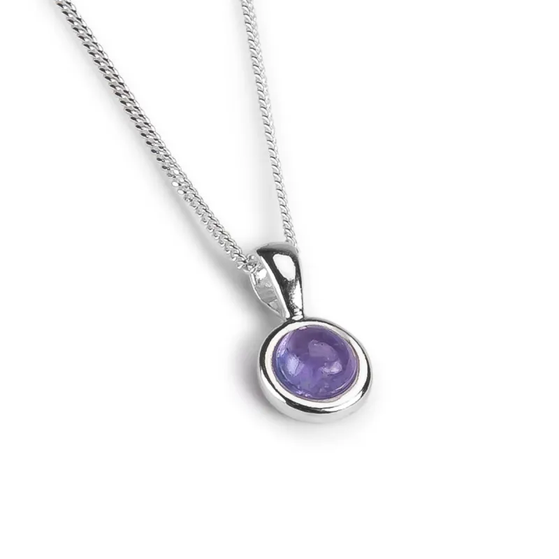 Round Charm Necklace in Silver and Tanzanite sold by Henryka