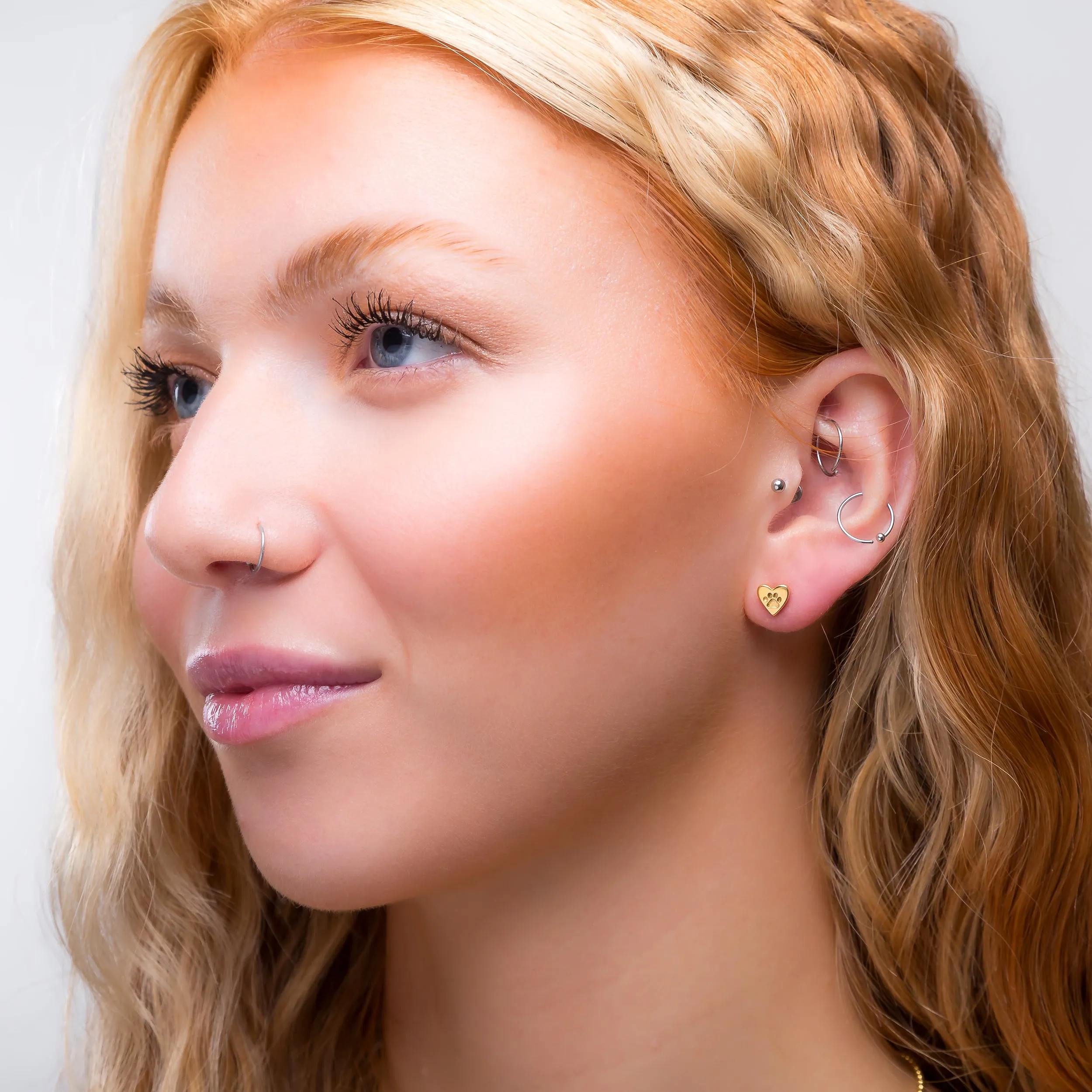 Heart Paw Print Stud Earrings in Silver with 24ct Gold sold by Henryka product image thumbnail 3