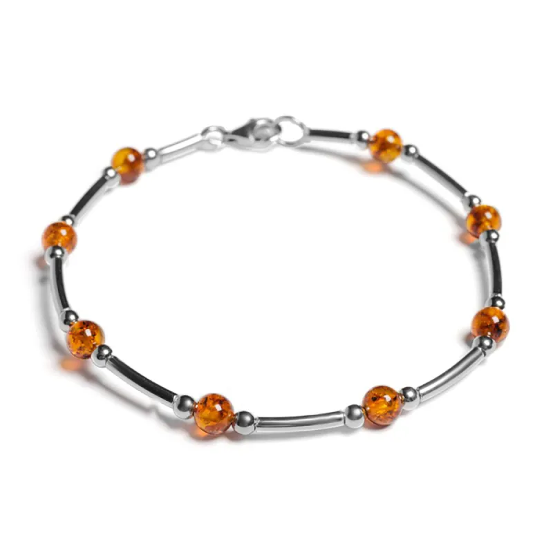 Bead Tube Bracelet in Silver and Cognac Amber sold by Henryka
