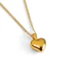 Miniature Heart Necklace in Silver with 24ct Gold Plating sold by Henryka