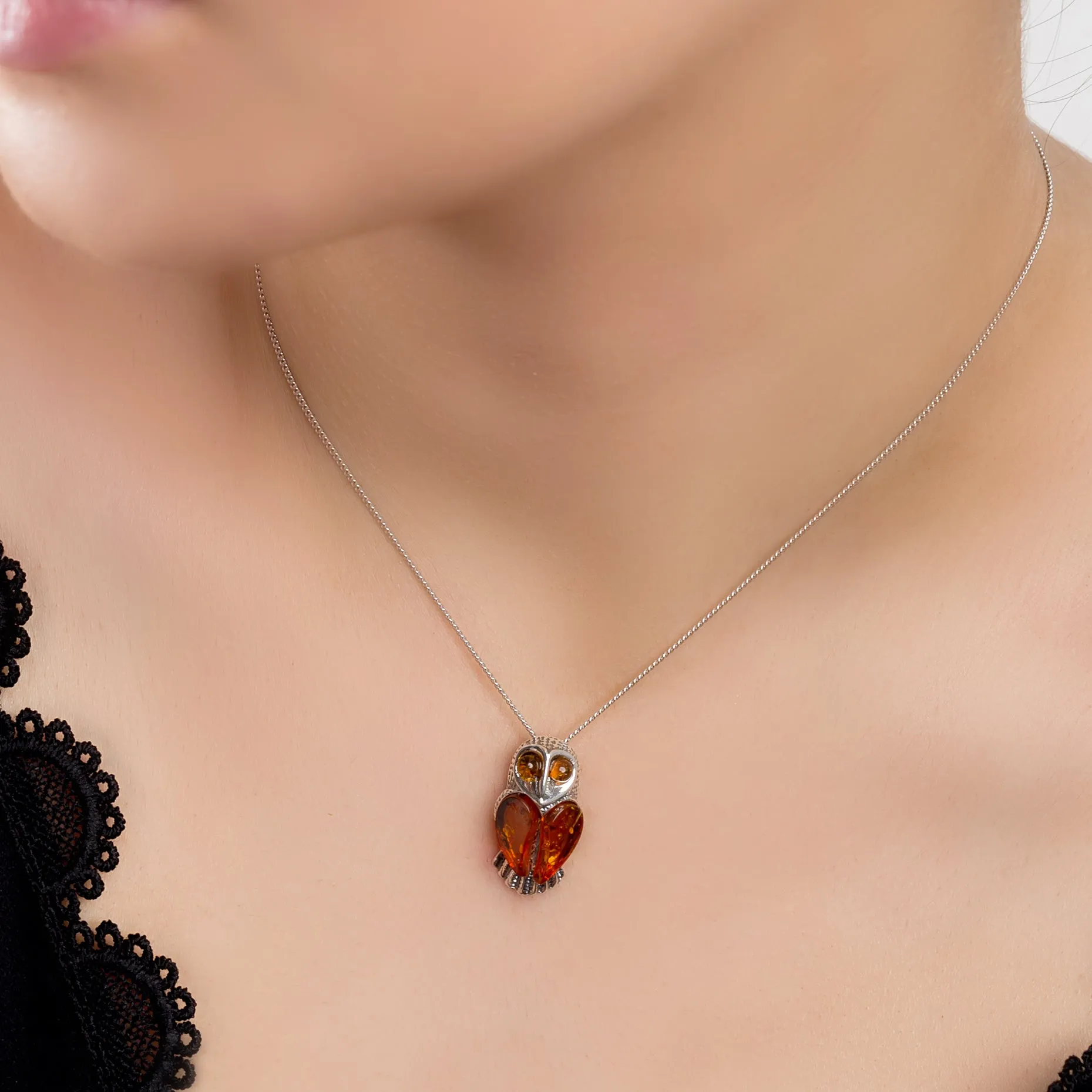 Barn Owl Bird Necklace in Silver and Cognac Amber sold by Henryka product image thumbnail 2