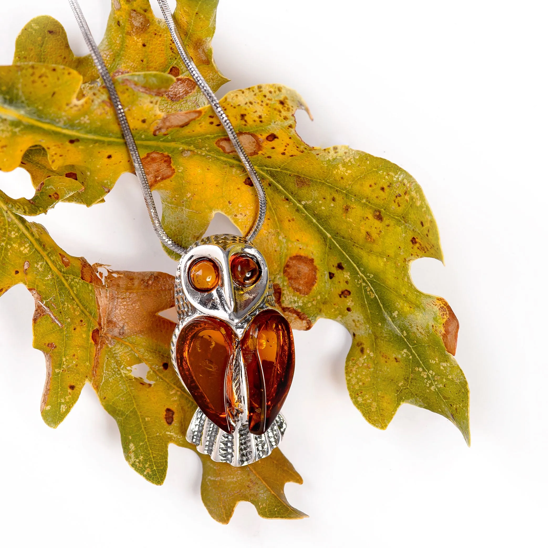 Barn Owl Bird Necklace in Silver and Cognac Amber sold by Henryka product image thumbnail 4