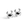 Crab Stud Earrings in Silver sold by Henryka