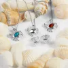 Crab Stud Earrings in Silver sold by Henryka