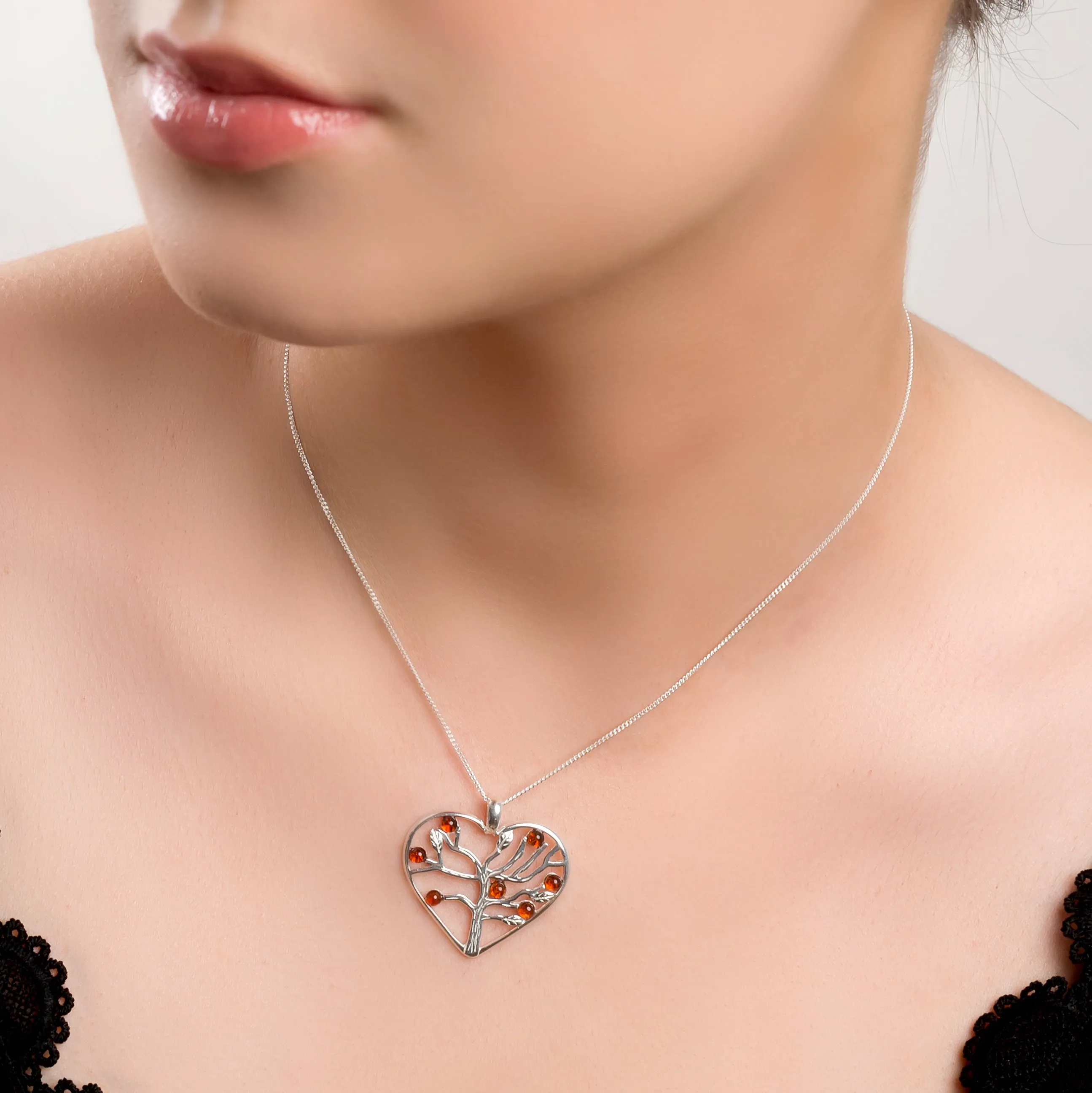 Symbol of Love Heart Necklace in Silver and Amber sold by Henryka product image thumbnail 2