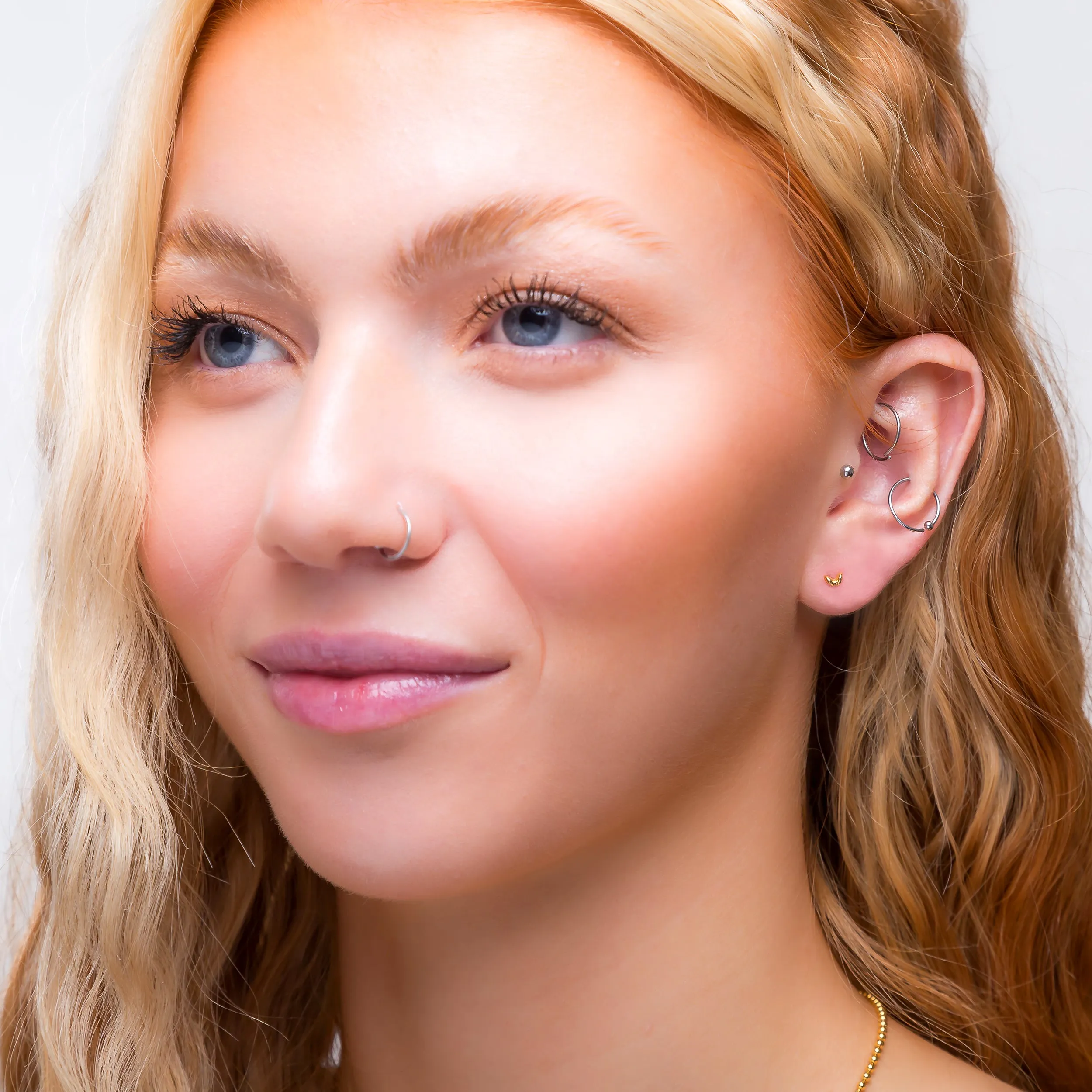 Tiny Double Leaf Stud Earrings in Silver with 24ct Gold sold by Henryka product image thumbnail 3