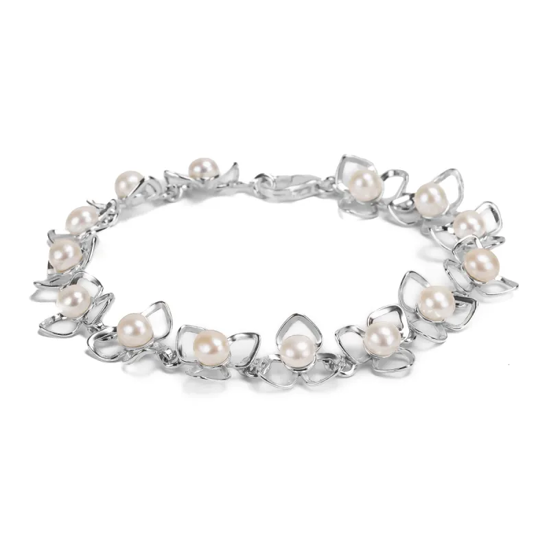 Flower Petal Bracelet in Silver & White Pearl sold by Henryka