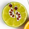 Orange Slice Fruit Drop Earrings in Silver and Cognac Amber sold by Henryka