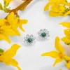 Daisy Stud Earrings in Silver and London Blue Topaz sold by Henryka