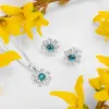 Daisy Stud Earrings in Silver and London Blue Topaz sold by Henryka