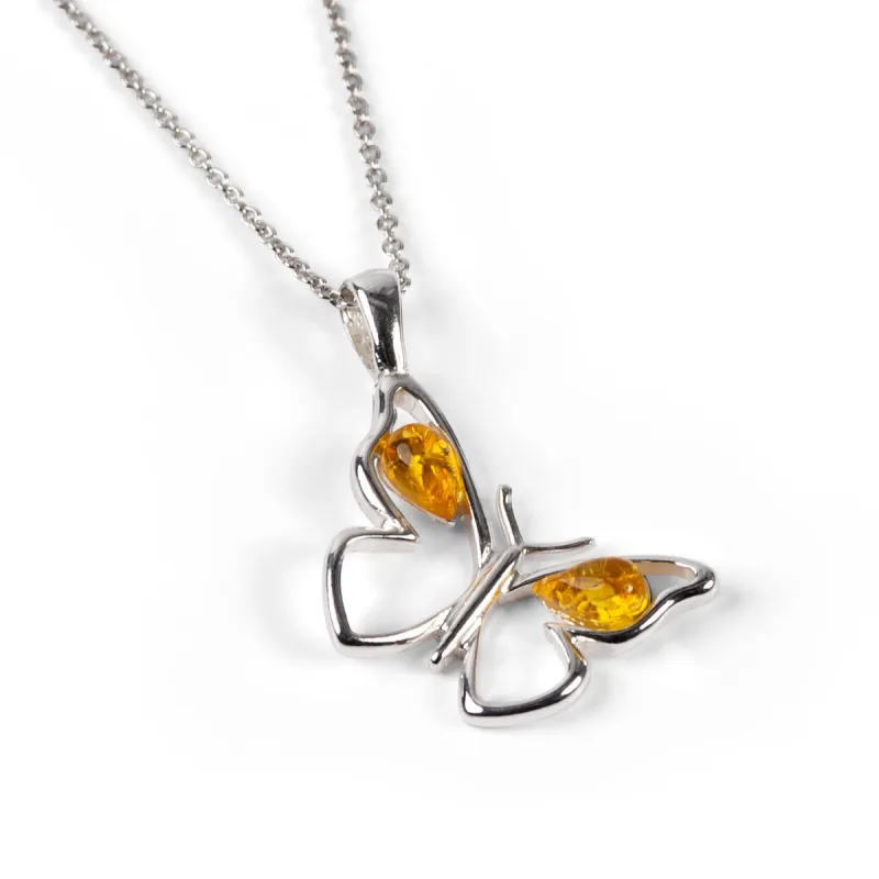 Small Butterfly Necklace in Silver & Yellow Amber sold by Henryka