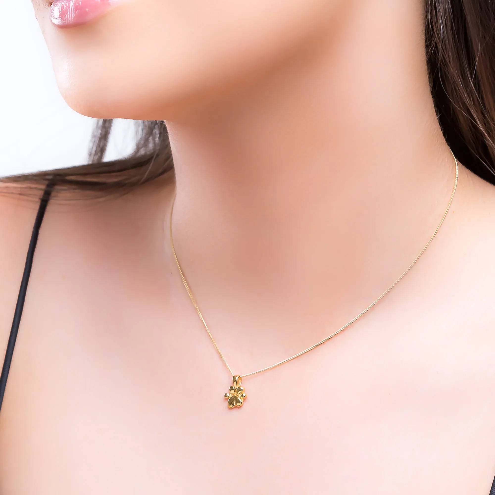 Paw Print Necklace in Silver with 24ct Gold sold by Henryka product image thumbnail 2