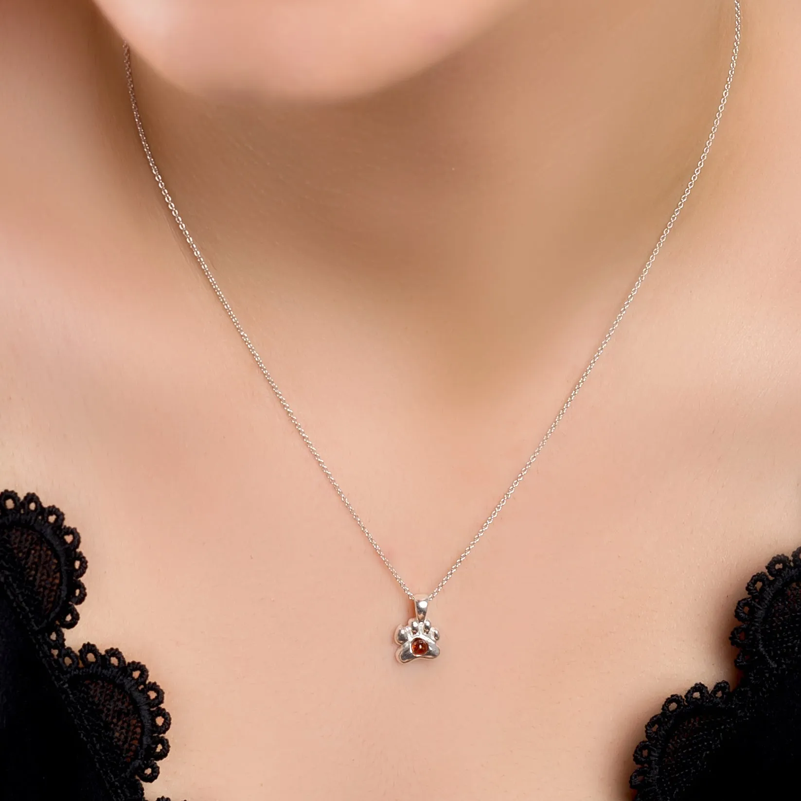 Paw Print Necklace in Silver and Amber sold by Henryka product image thumbnail 2