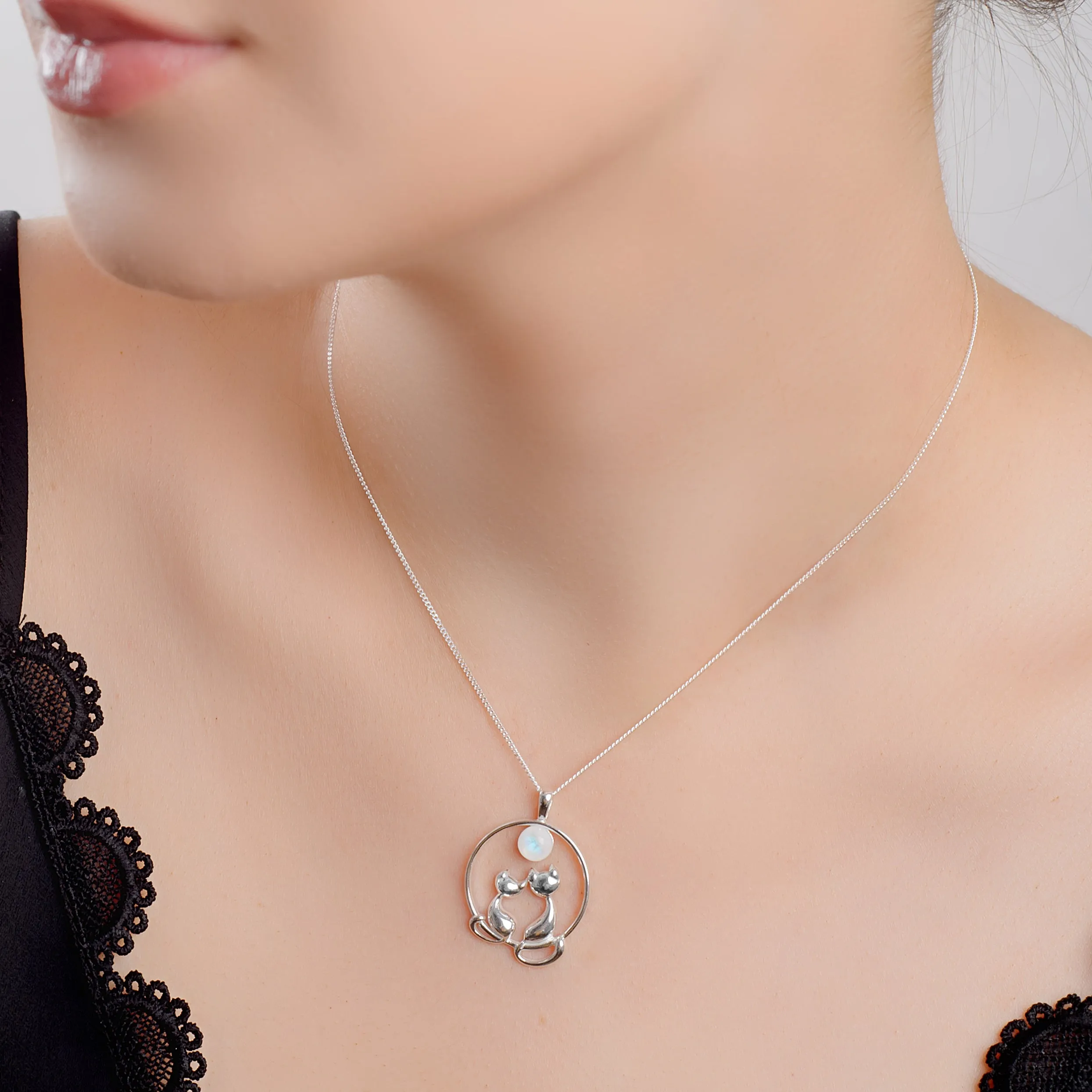Cuddling Cats Necklace in Silver and Moonstone sold by Henryka product image thumbnail 2