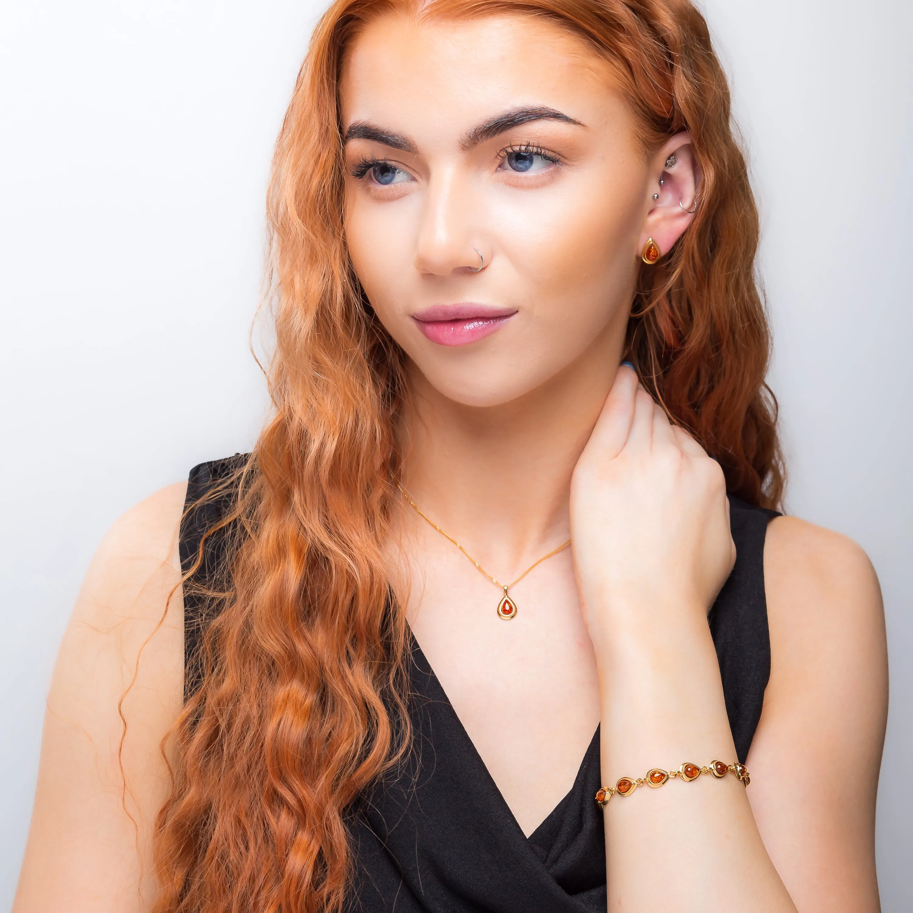 Classic Teardrop Link Bracelet in Silver with 24ct Gold and Amber sold by Henryka product image thumbnail 4