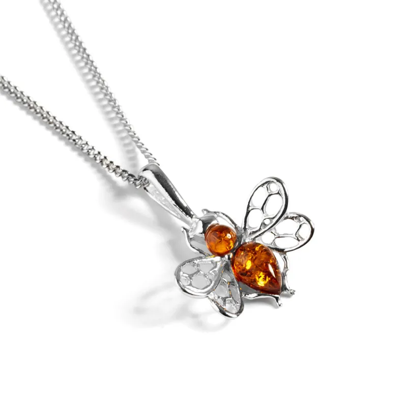Tiny Honey Bee Necklace in Silver and Amber sold by Henryka